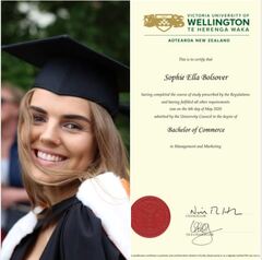 girl wearing a mortarboard and a picture of her degree.